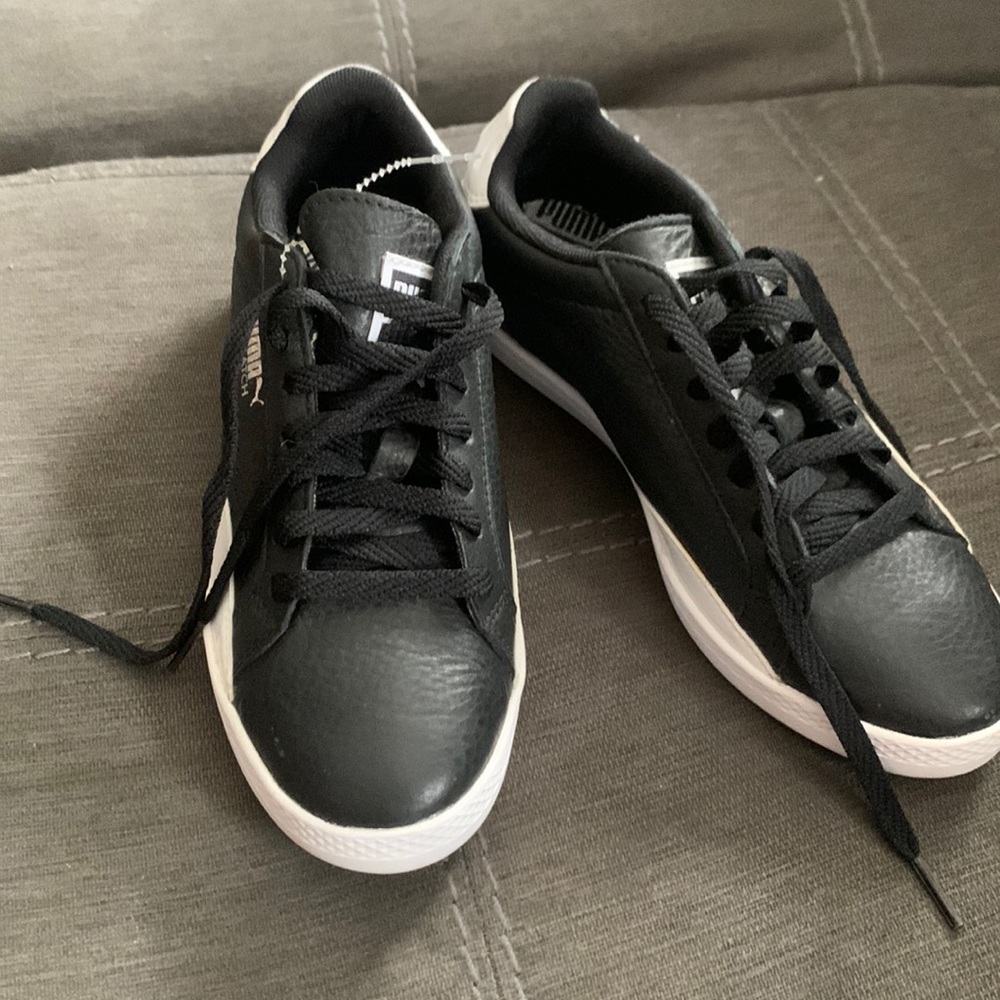 Black and White Leather Puma’s.  SIZE 5 1/2. Brand New!!